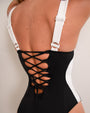 Model wears Brazilian Lifty Underwire Shapewear Swimsuit - Contour Black/White close up back