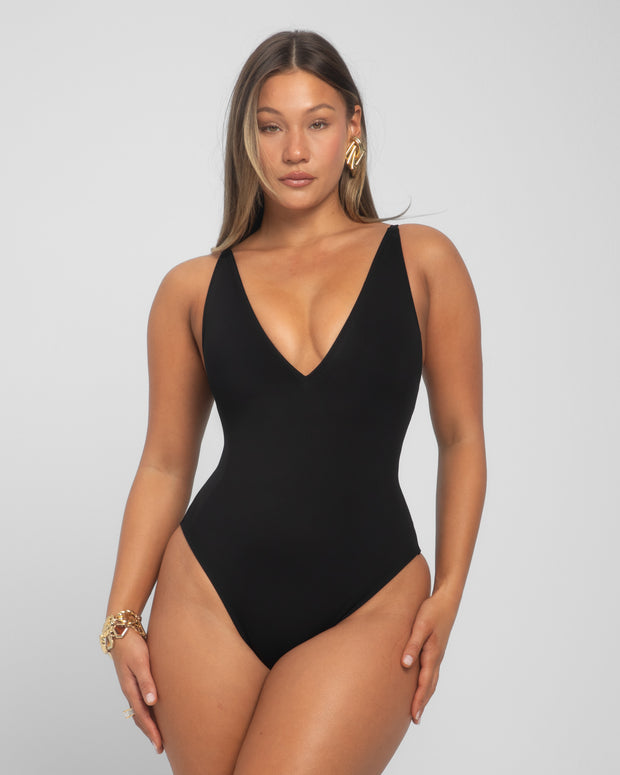 Model wears Brazilian Plungey Cheeky One Piece Shapewear Swimsuit - Black full front view