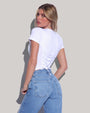 Model wears Short Sleeve Corsety Sculpting Shapewear Top - White with jeans back view