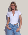 Model wears Short Sleeve Corsety Sculpting Shapewear Top - White with jeans front view