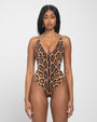 Model wears Brazilian Plungey Cheeky One Piece Shapewear Swimsuit - Symmetric Leopard front view