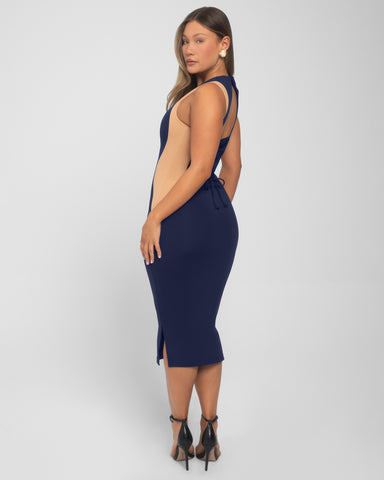 Model wears Illusion Column Midi Shapewear Dress - Contour Midnight/Sand side view