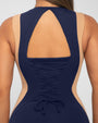 Model wears Illusion Column Midi Shapewear Dress - Contour Midnight/Sand open back close up