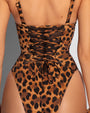 Model wears Brazilian Bombshell - Symmetric Leopard Shapewear Swimsuit back view close up