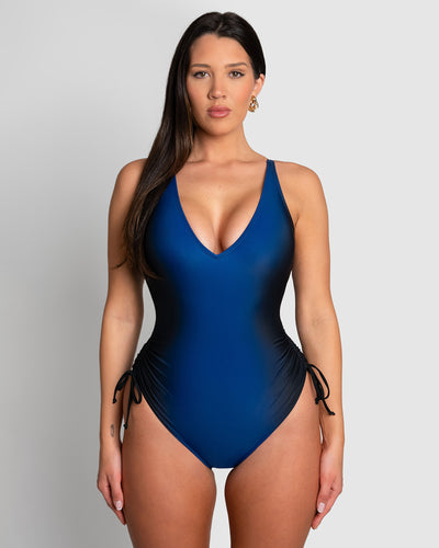 Model wears Plungey Cinched Leg Adjustable Shapewear Swimsuit Midnight Ombre