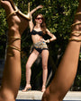 Editorial shot of model in Square Scarf - Tiger Chain worn as a skirt