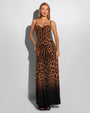 Model wears Brazilian Bombshell - Symmetric Leopard Shapewear Swimsuit with a matching skirt full front view
