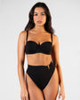 Front view of Brazilian Ring Kini Bottom - Black paired with Bombshell Bikini Top - Black on model
