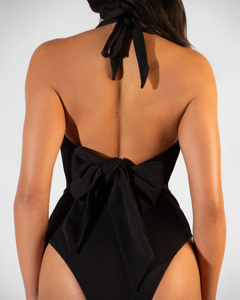 Close up back view of model in Brazilian Halter Plungey - Picot Black
