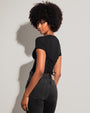 Model wears Short Sleeve Corsety Sculpting Shapewear Top - Black side view