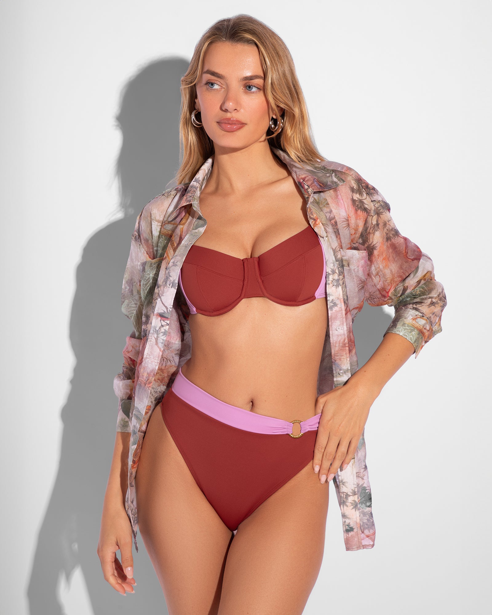 Model is posing in Flowy Oversized Collared Button Front Shirt - Soft Tropical open front