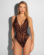 Model wears Hi Cut Plungey Triangle Shapewear Swimsuit - Clay Zebra/Black