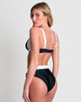 Model is wearing Lifty Shapewear Wide Strap Underwire Bikini Top - Black/White and a matching bottom back view