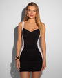 Model wears Mini Ruched Skirty Shapewear Swim Cover-Up - Contour Black/White front view
