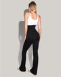Model wears Corsety Flare Sculpting Shapewear Legging - Black full body view back