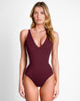 Model wears Plungey - Contour Dark Cherry/Oat One Piece Shapewear Swimsuit front view