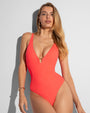 Model is posing in Plungey Triangle Thong One Piece Shapewear Swimsuit - Hot Coral front view