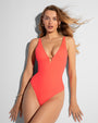Model wears Plungey Triangle Thong One Piece Shapewear Swimsuit - Hot Coral front view