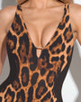 Model wears Plungey Triangle - Symmetric Leopard/Black Shapewear Swimsuit Deep plunge neckline close up