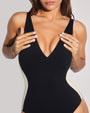 Model wears Plungey - Contour Black/Oat Open Back Shapewear Swimsuit front view close up