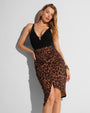 Model wears Sarong Skirty Knee Length Faux Wrap Cover-Up - All Over Leopard front view