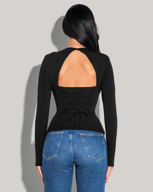 Model wears Shapey Crew Neck Long Sleeve Sculpting Shapewear Top - Soft Modal Jersey Black back view