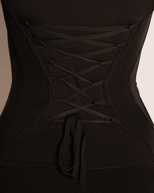 Model wears Shapey Ruched Long Sleeve Shapewear Top - Black back close up