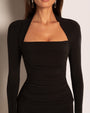 Model wears Shapey Ruched Long Sleeve Shapewear Top - Black front close up