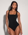 Model wears Squarey - Black One Piece Sculpting Shapewear Swimsuit full front view