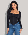 Model is posing in Corsety Square Neck Long Sleeve Sculpting Shapewear Top - Black