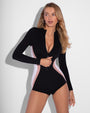 Model wears Surfy Boy Shortie Shapewear Swimsuit - Contour Black/Rose/White front view unzipped