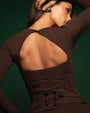 Model posing in Sweetie Long Sleeve Sculpting Shapewear Top - Espresso back view
