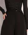Model wears Pleaty Wide Leg Pleated Pant - Black back view close up