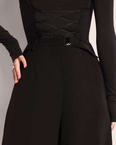 Model wears Pleaty Wide Leg Pleated Pant - Black back view close up