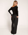 Full body back view of model in Shapey Bias Long Sleeve Top - Black
