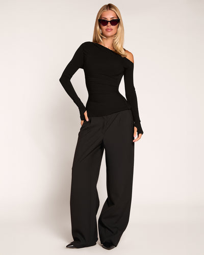Full body front view of model wearing Shapey Bias Long Sleeve Top - Black