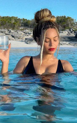 Beyonce wears Plungey Swim Dress in color black