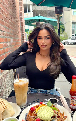 Christen Dominique wears Ta3