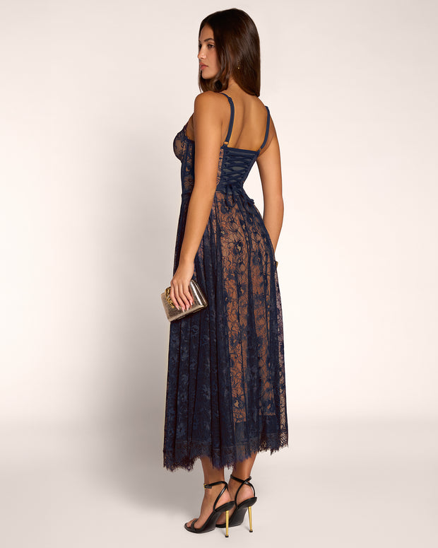 Full body back view of model in Bombshell Midi Dress - Lace Midnight/Tawny