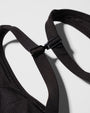Close up flat lay of the racerback clip on Plungey - Black