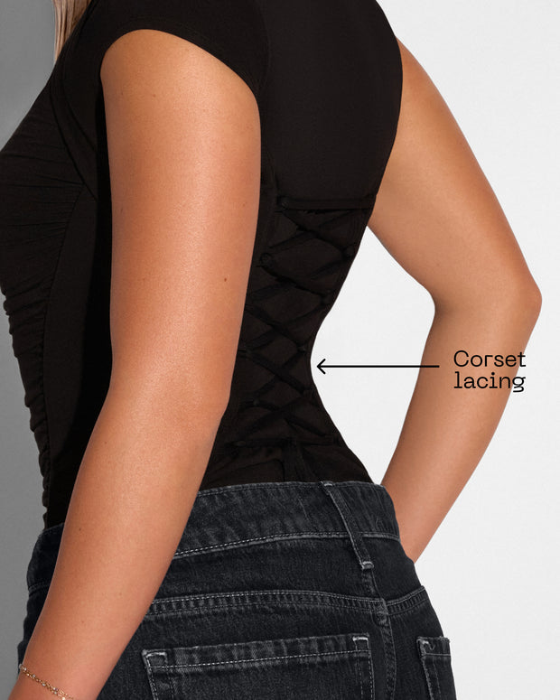 Graphic highlighting the back corset lacing on Shapey Ruched Short Sleeve Top - Black